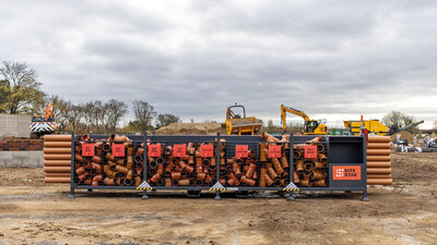 Front view of a SiteStak workstation full of underground drainage