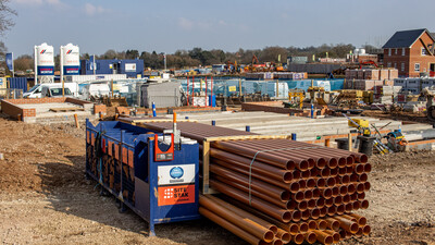 A full pack of drainage pipes stacked in a SiteStak storage system at M&J Evans construction site