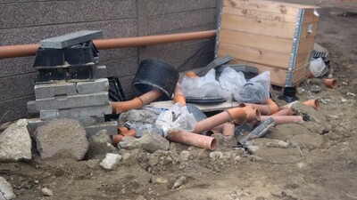 Messy building site damaged materials