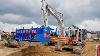 JJ Mac SiteStak moving with Excavator